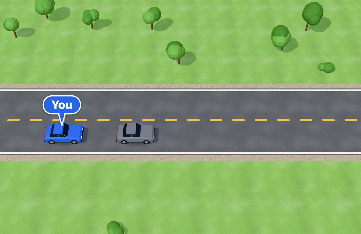 Two-lane road with a broken yellow center line